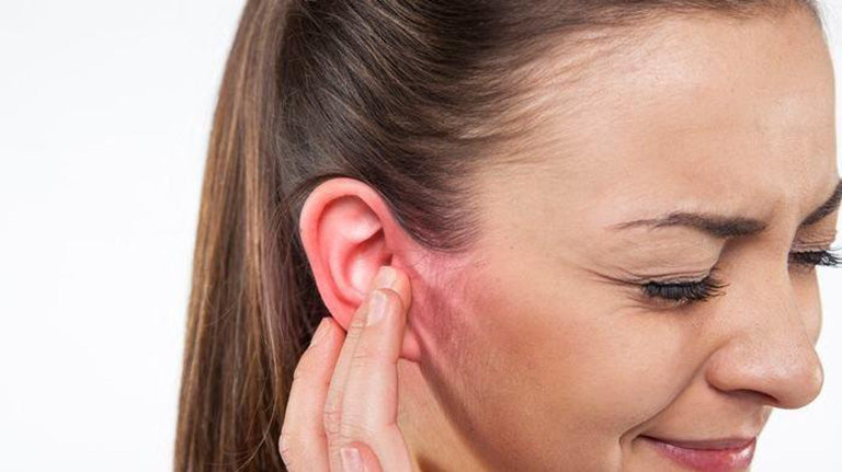 What happens if your ears hurt after not wearing earrings for a long time?